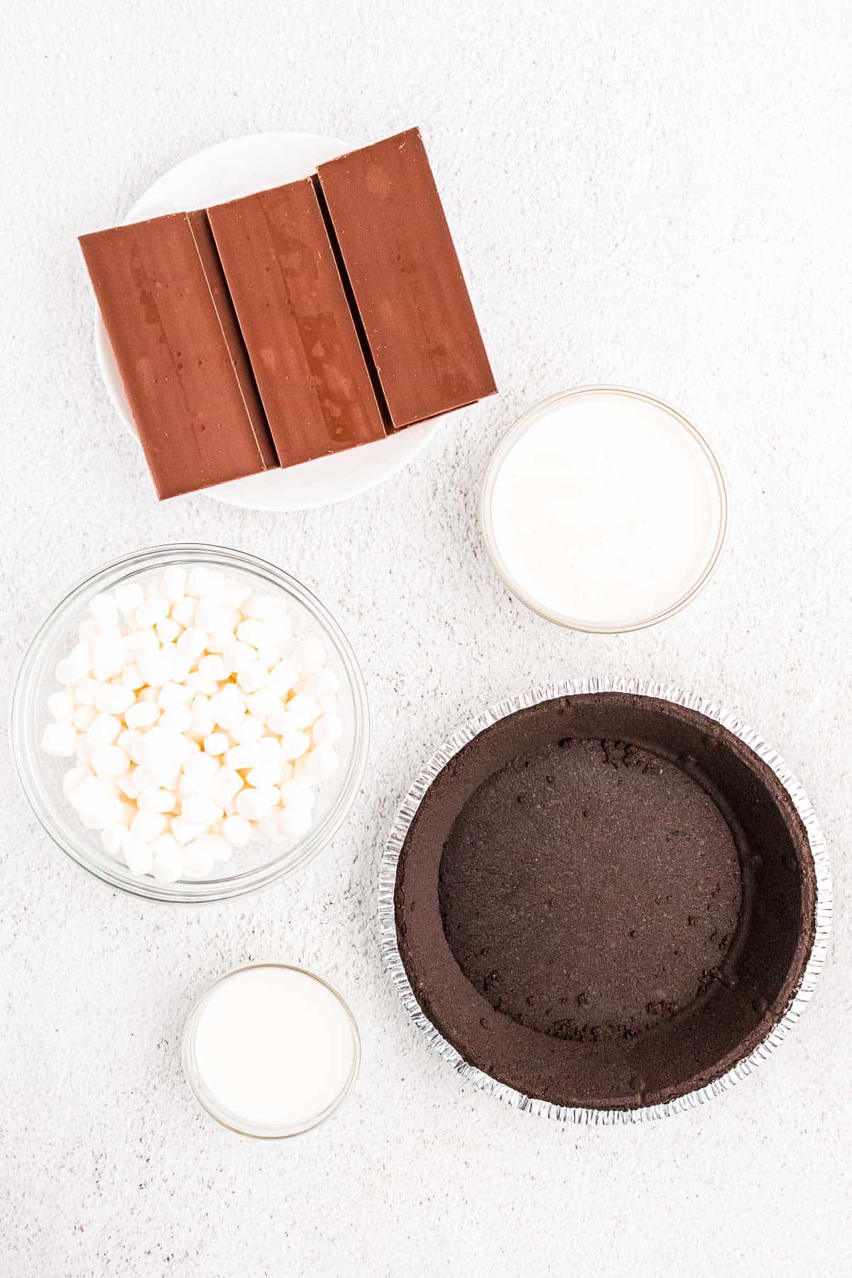 Ingredients to make no bake chocolate pie on a table.