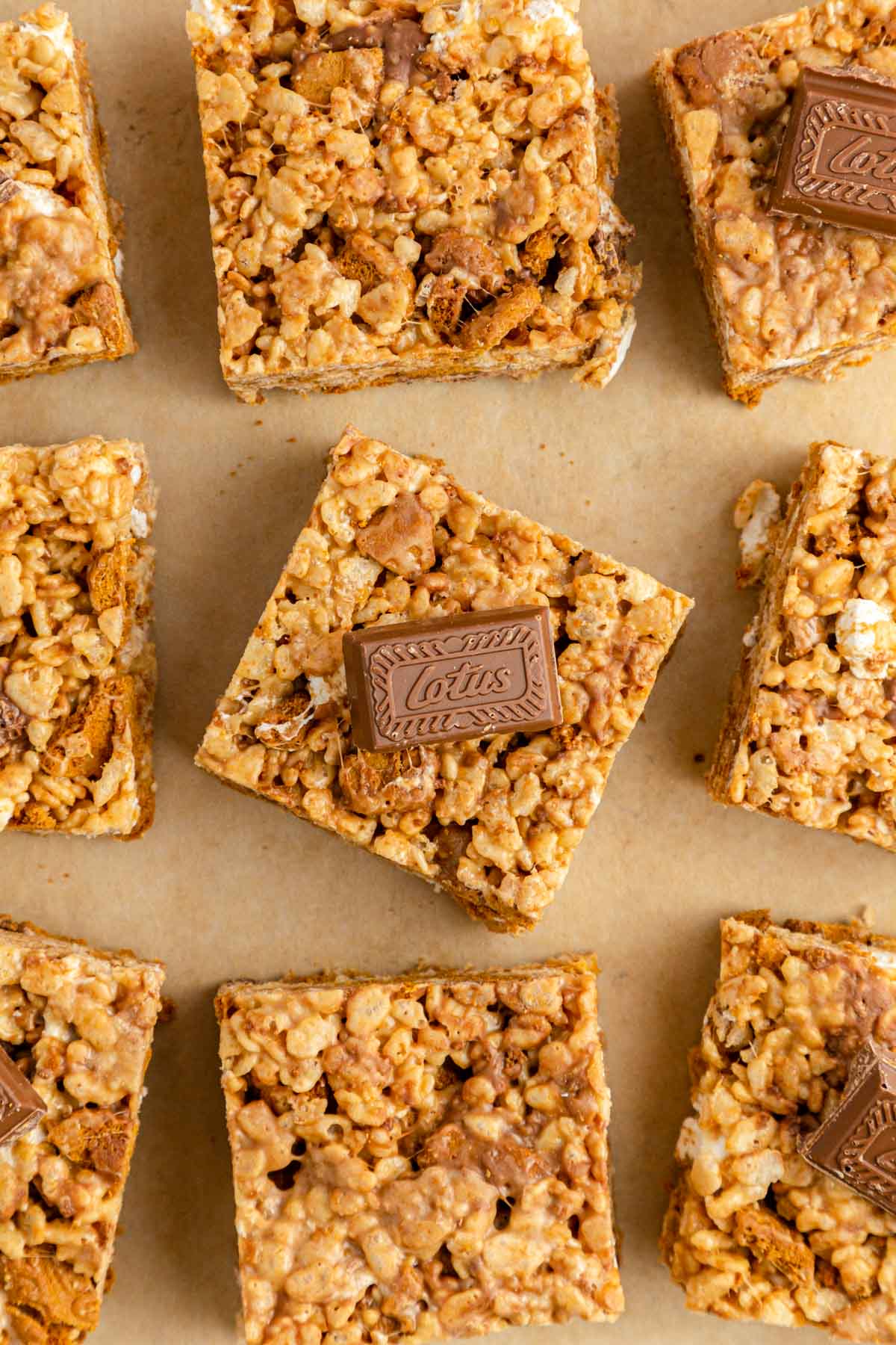 Overhead photo of biscoff rice krispie treats on a piece of parchment paper.