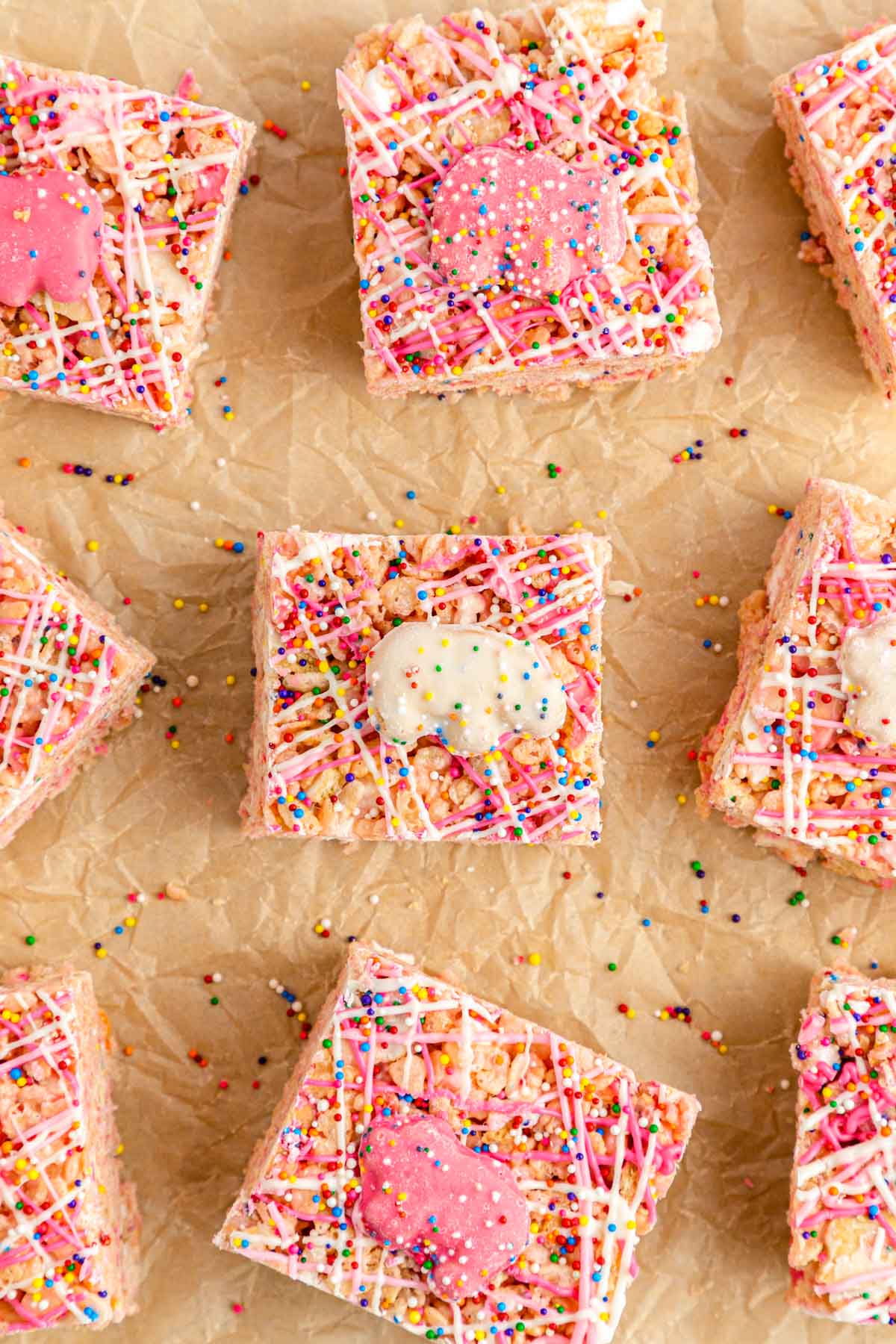 Overhead photo of Circus Animal Rice Krispie treats on a piece of parchment paper.