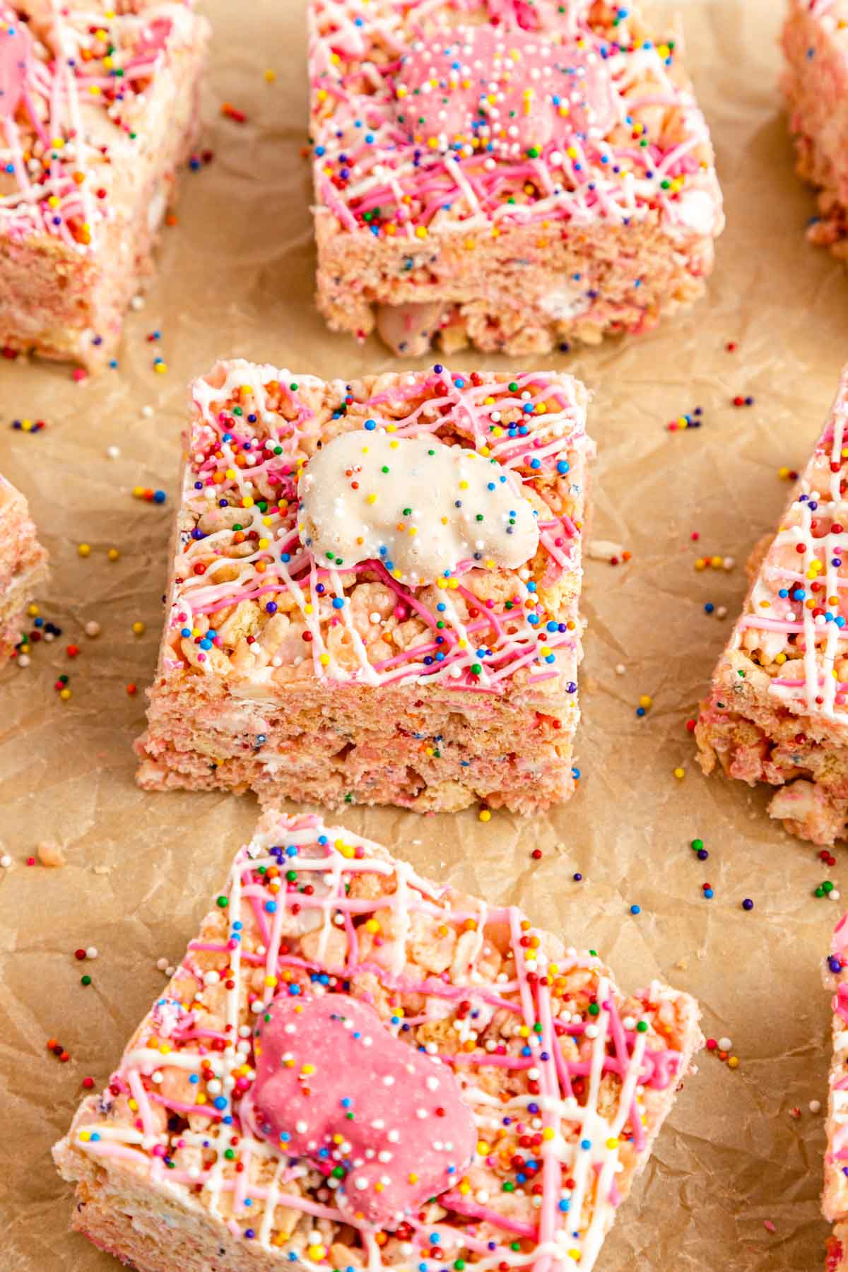Overhead photo of Circus Animal Rice Krispie treats on a piece of parchment paper.