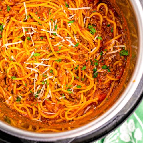 Overhead photo of an instant pot filled with spaghetti and meat sauce.