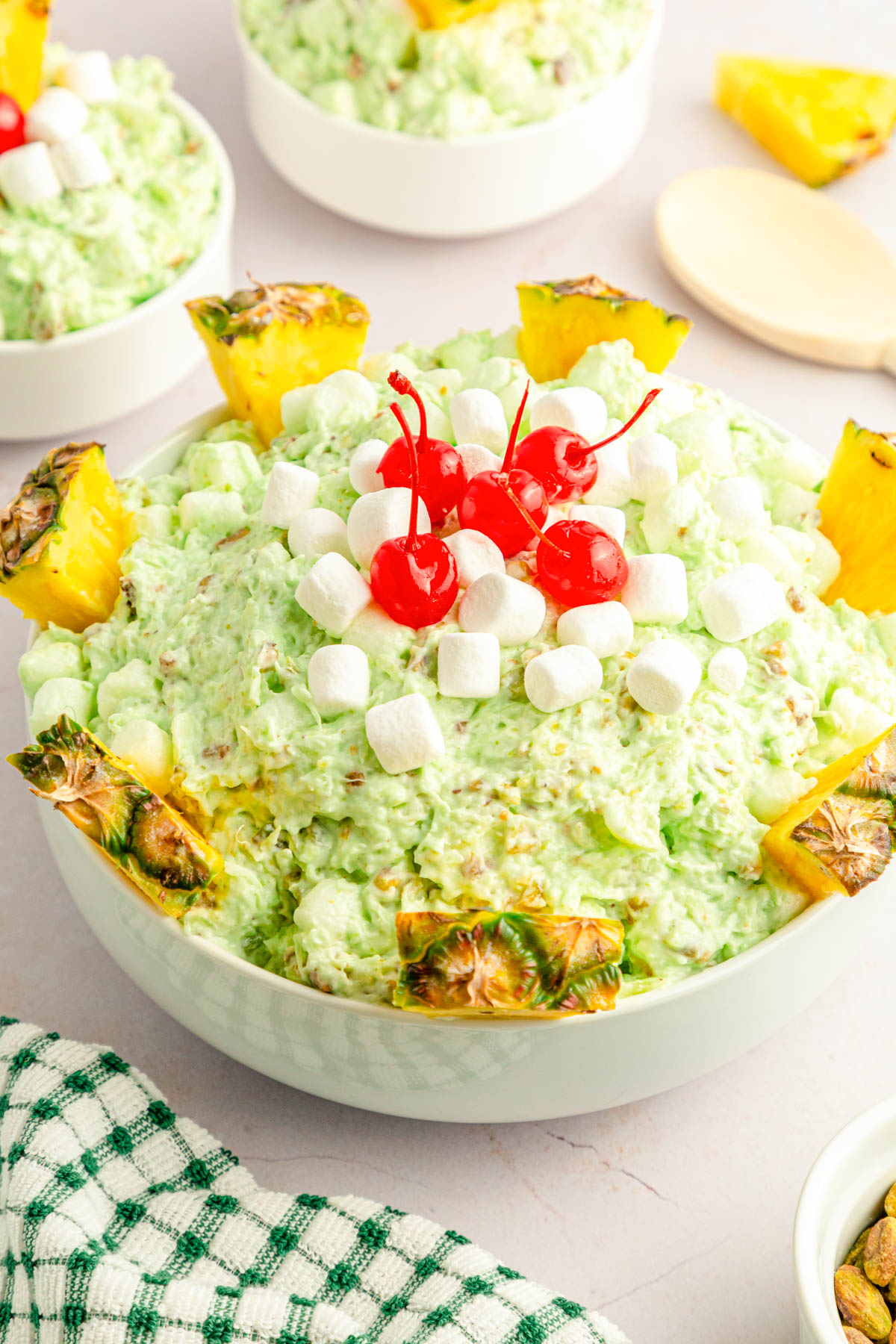A big bowl filled with watergate salad.