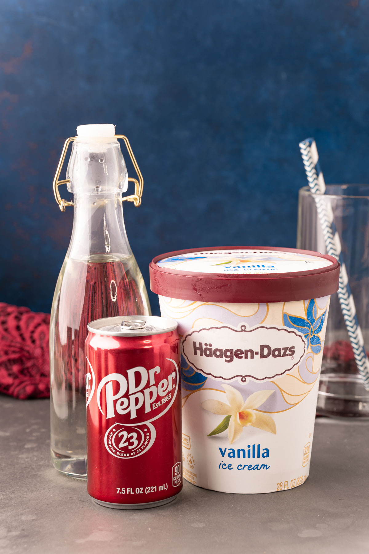 Ingredients on a table to make Dr Pepper Floats.